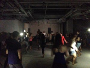 Dancers moving in the dark